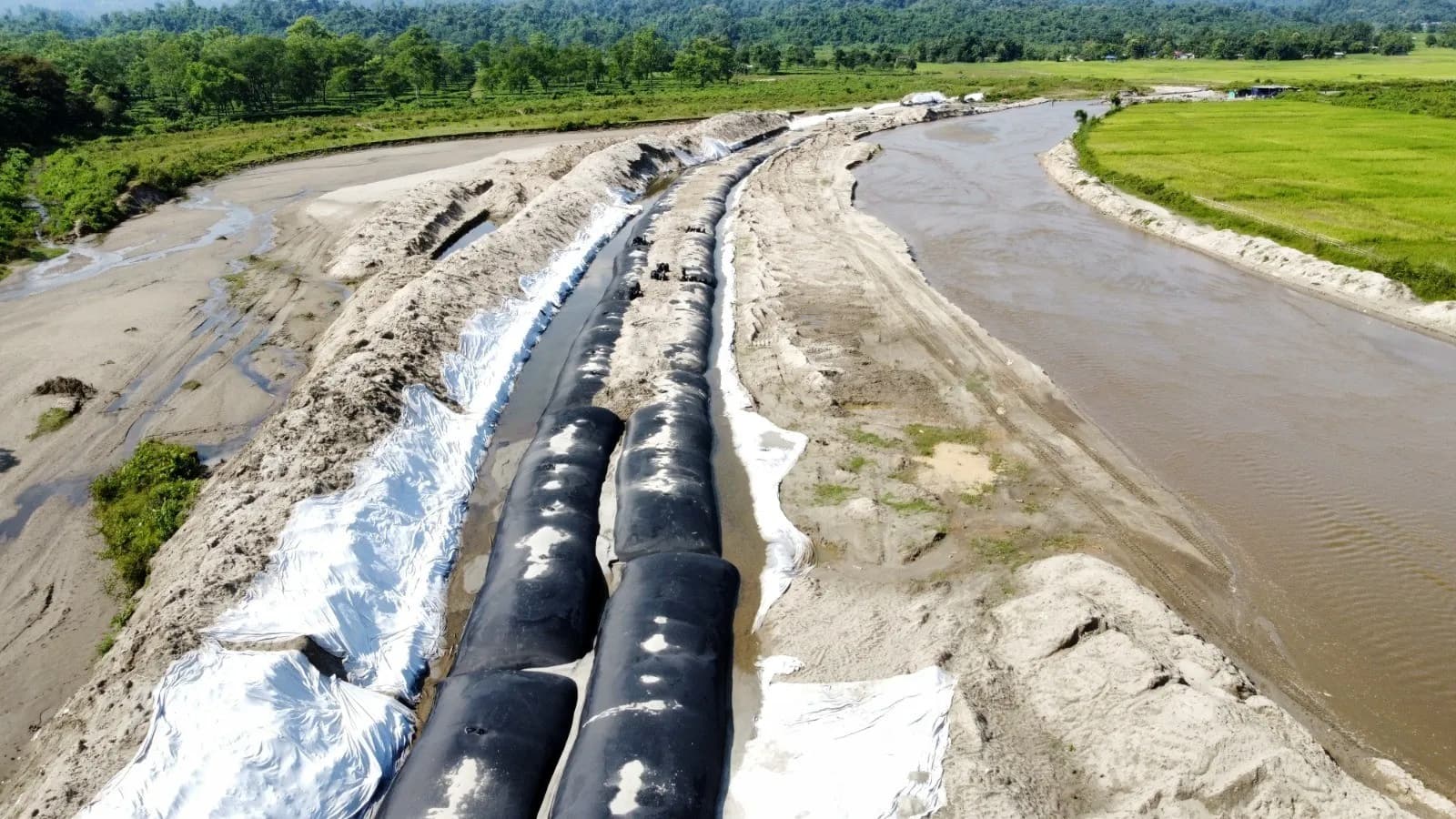 Woven Geotubes for Coastal and Dewatering Applications